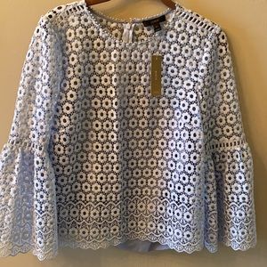 NWT blouse from JCrew. Light blue color. Size 6T. Bell sleeves. Slip included.